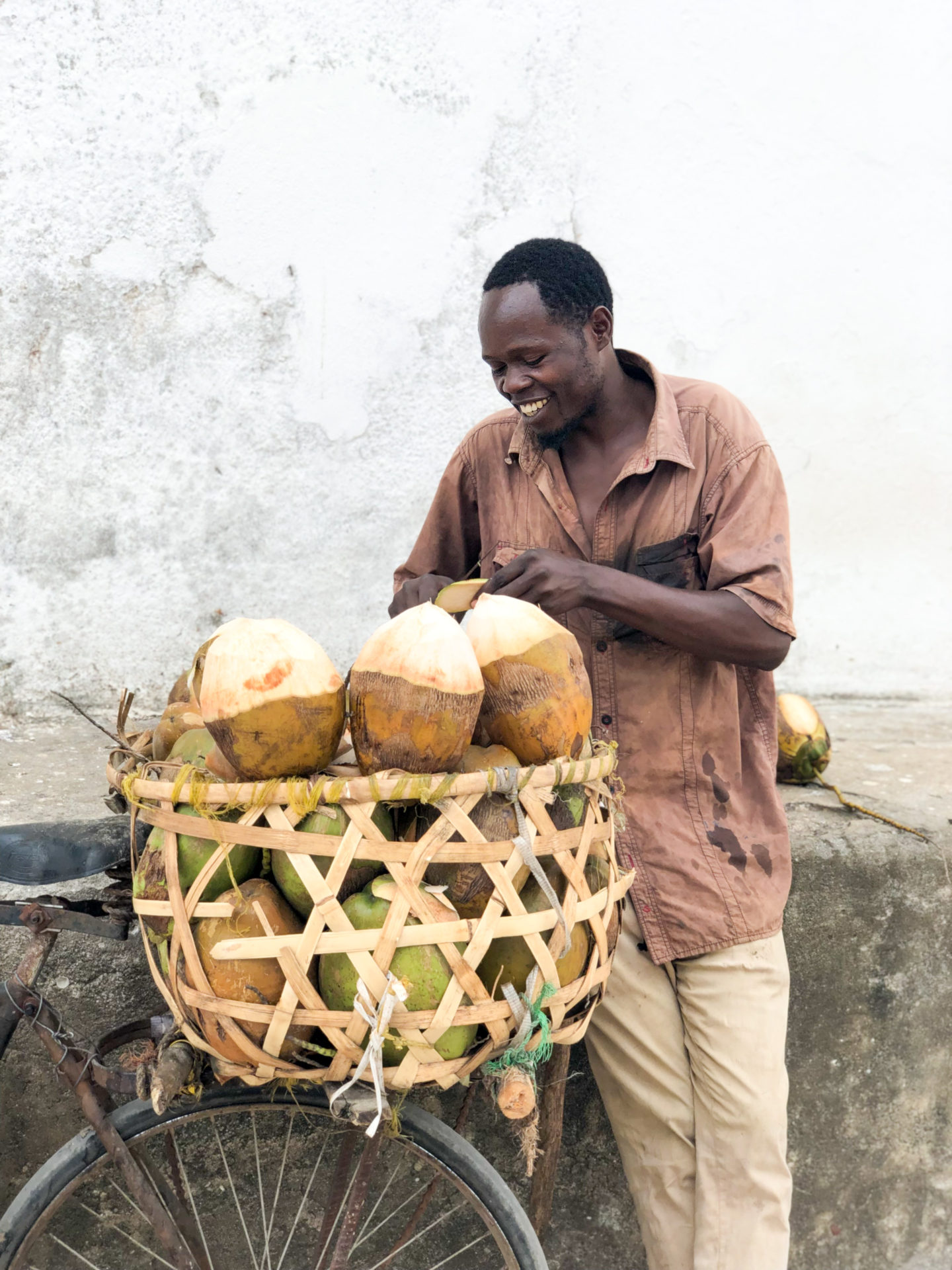 Zanzibar travel guide - stone town coconut seller