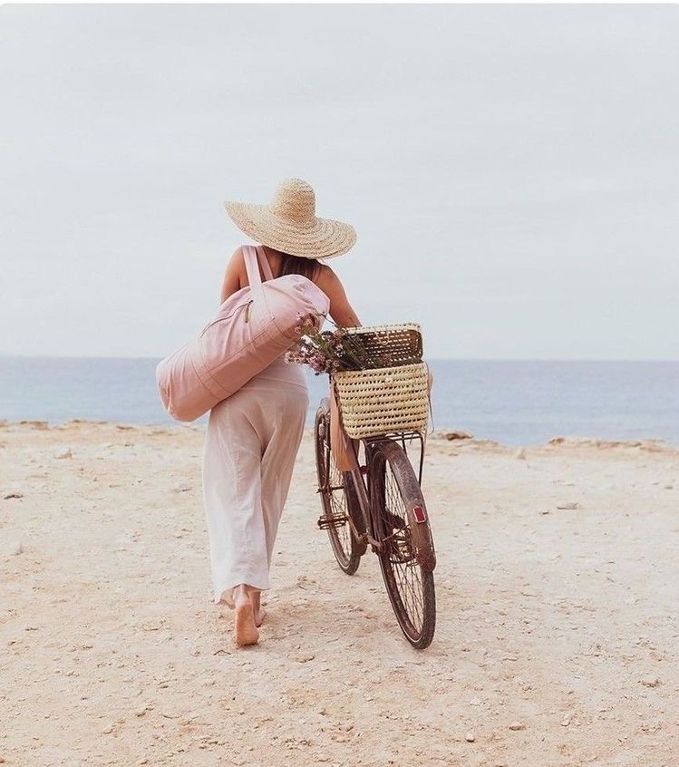 woman with a bike on the beach. bike riding on the beach. summer inspiration. summer bucket list ideas. Fun things to do this summer. things to do in summer. things to do in the summer. things to do for summer. summer bucket lists. summer activities. activity summer. activities this summer. bucket lists for summer. bucket lists for the summer. bucket list ideas for summer. ideas for summer bucket list.