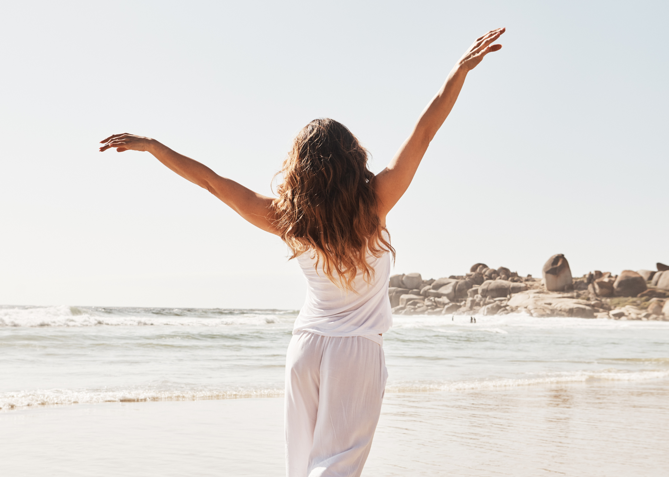happy woman on the beach. relax after a long, hard, stressful day at work or at home. Ways to unwind and decompress after a busy day and relieve stress.