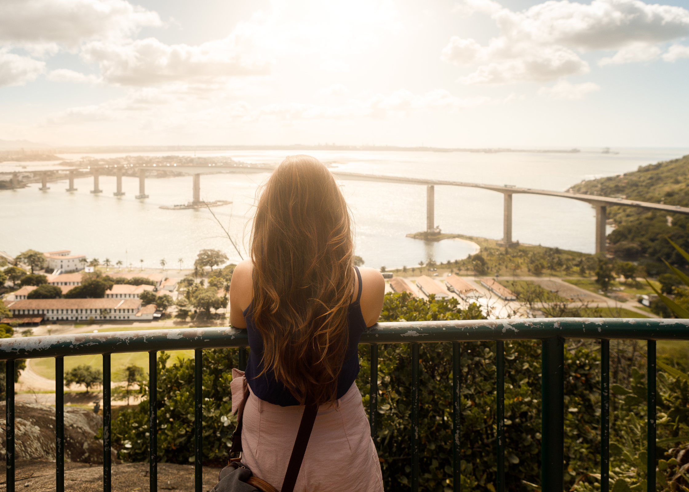 woman looking out over at a stunning view. how to take time for yourself. self care ideas for mind body and soul. self-care ideas for mental health. me time ideas
