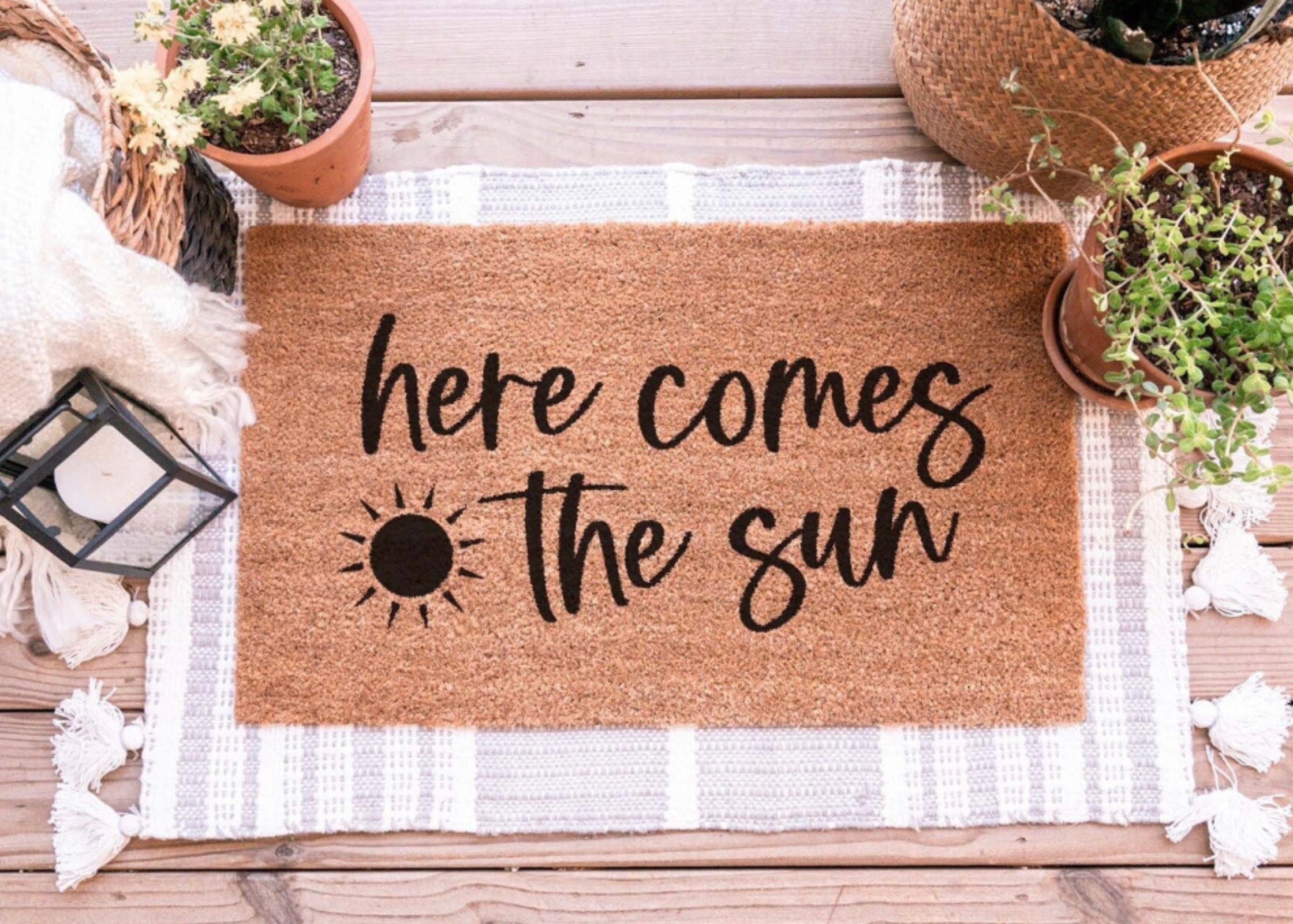 here comes the sun doormat. spring doormat. Spring decor ideas. decorating for spring. decor for spring. How to update your home for spring. resfresh home. get home spring ready. how to transition your home from winter to spring