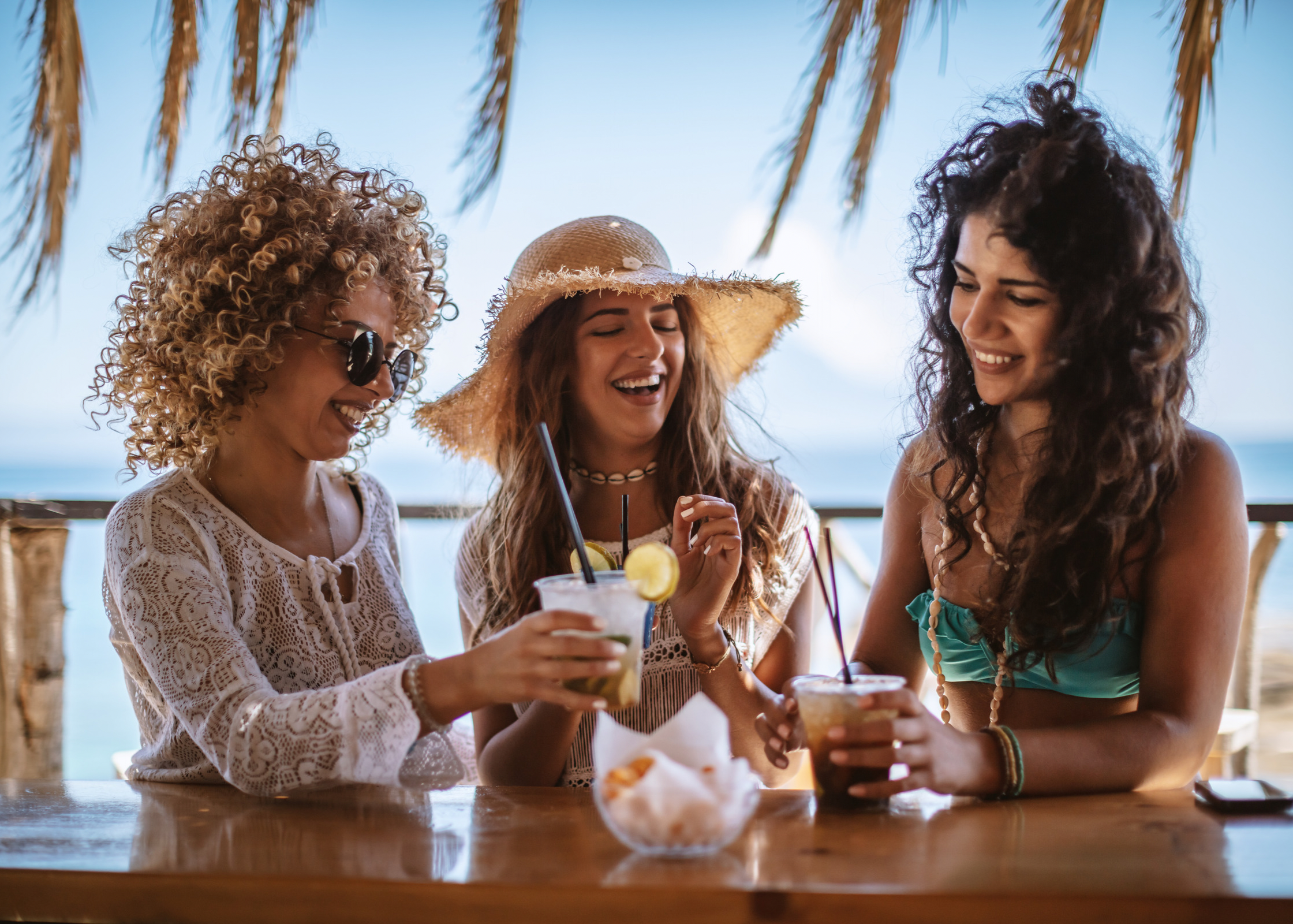 best friends having a drink and brunch on holiday. relax after a long, hard, stressful day at work or at home. Ways to unwind and decompress after a busy day and relieve stress.